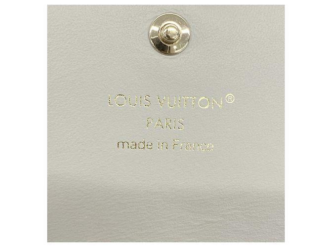 Louis Vuitton Portefeuille Capucines Tiny Wallet Castaño - vista 4