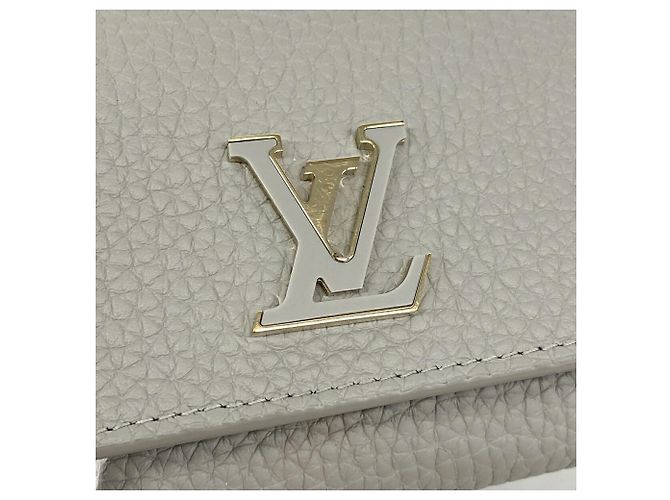 Louis Vuitton Portefeuille Capucines Tiny Wallet Castaño - vista 7