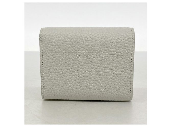 Louis Vuitton Portefeuille Capucines Tiny Wallet Castaño - vista 8