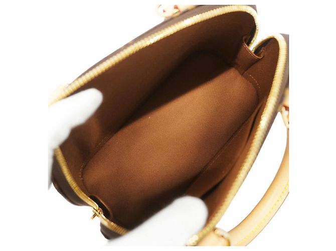 Bolsa de mão Louis Vuitton Alma BB Monogram Marrom - vista 4