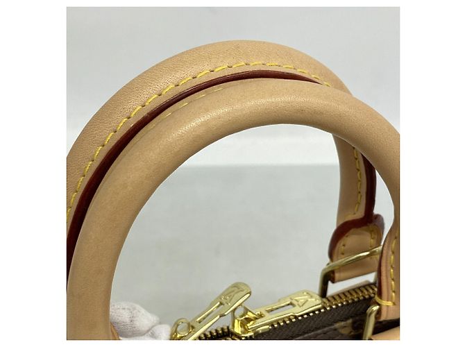 Bolso de mano Louis Vuitton Alma BB Monogram Castaño - vista 8