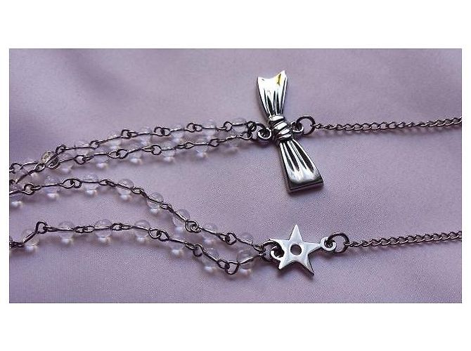 Autre Marque Collana Dior in metallo argentato con pendenti stella, fiocco e CD Argento - vista 5
