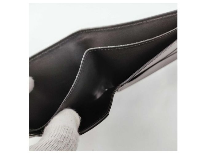 Portafoglio bi-fold Louis Vuitton in Monogram Shadow nero - vista 10