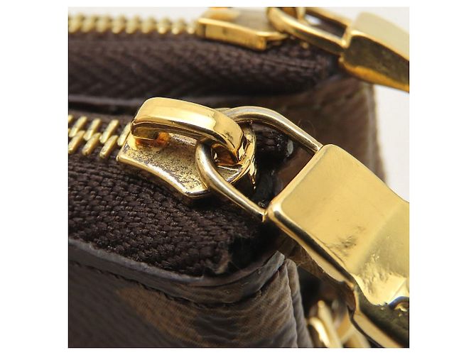 Bolsa de Ombro Louis Vuitton Monogram Giant Reverse Pochette Marrom - vista 11