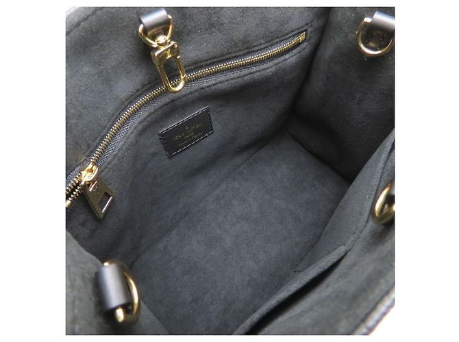 Bolsa Louis Vuitton Monogram Empreinte OnTheGo PM Preto - vista 9
