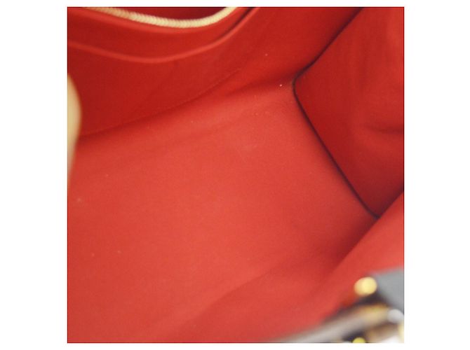 Louis Vuitton OnTheGo Reverse Monogram Giant GM Castaño - vista 3