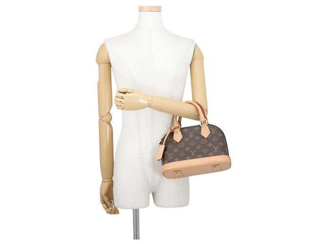 Bolso de mano Louis Vuitton Alma BB Monogram Castaño - vista 4