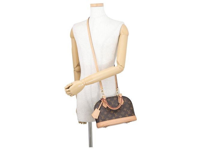 Bolso de mano Louis Vuitton Alma BB Monogram Castaño - vista 5