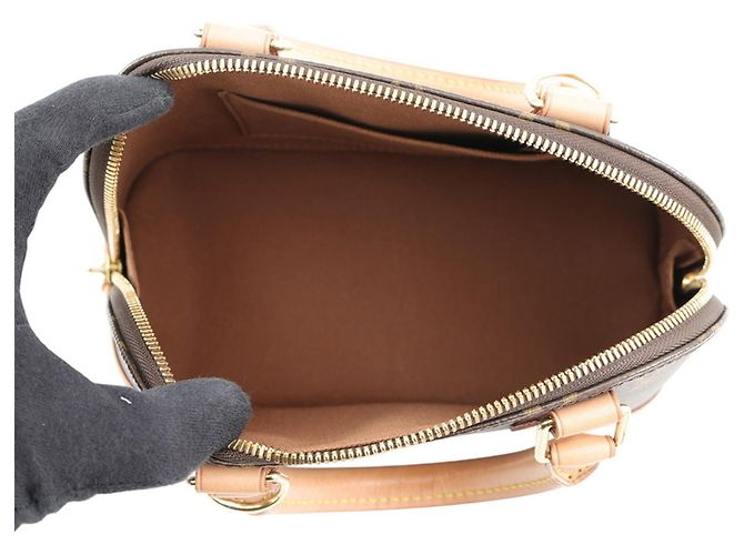Bolso de mano Louis Vuitton Alma BB Monogram Castaño - vista 6