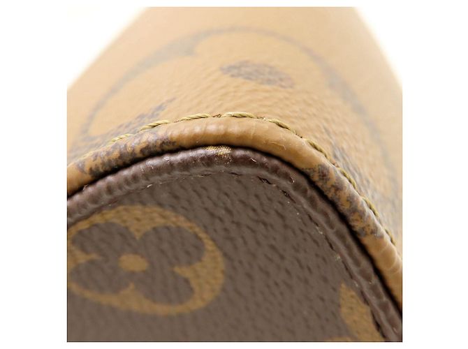 Bolso Louis Vuitton Monogram Giant Reverse OnTheGo PM Castaño Monograma - vista 14