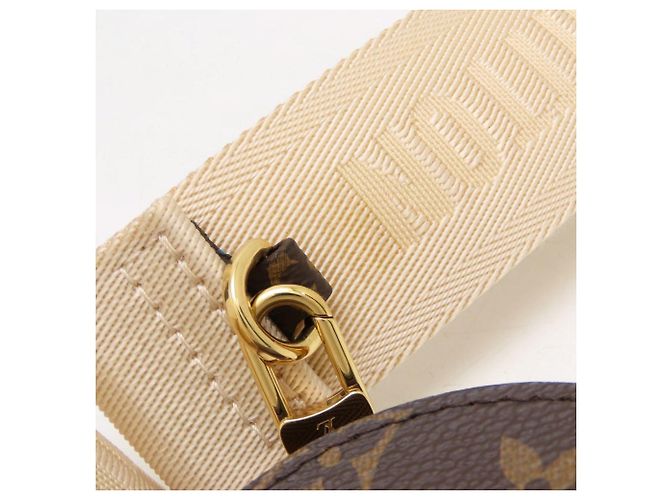 Bolso Louis Vuitton Monogram Giant Reverse OnTheGo PM Castaño Monograma - vista 21