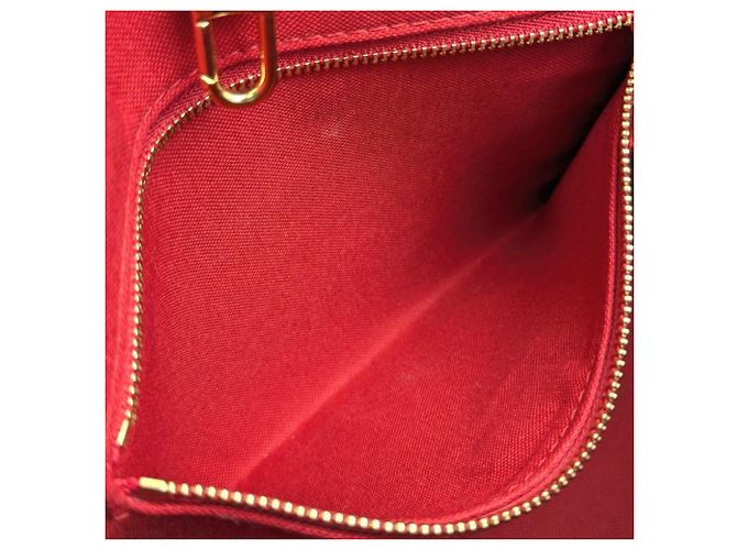 Bolso Louis Vuitton Monogram Giant Reverse OnTheGo PM Castaño Monograma - vista 8