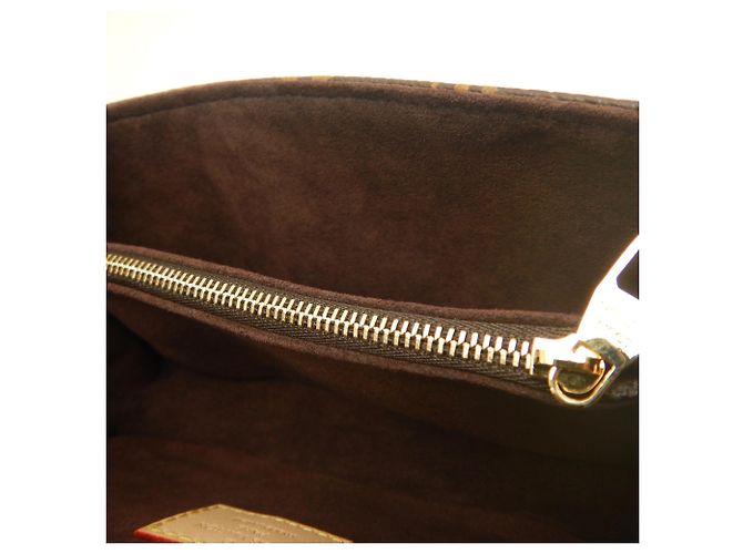 Bolsa Louis Vuitton Monogram Pochette Métis EW Marrom Monograma - vista 12