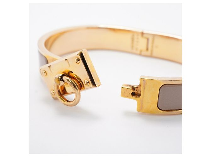 Bracelete Hermès Clic H GP Plated Gold Greige Dourado Cinza - vista 4