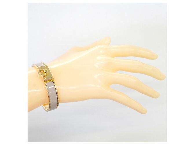 Bracelete Hermès Clic H GP Plated Gold Greige Dourado Cinza - vista 6