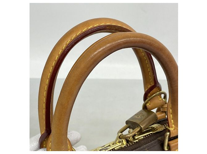 Bolso de mano Louis Vuitton Alma BB Monogram Castaño - vista 8