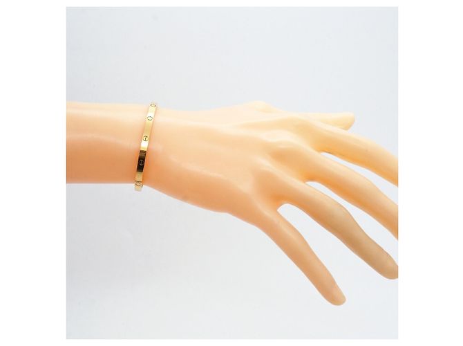 Bracciale Cartier Love Modello Piccolo Bangle in Oro Giallo 18K - vista 6