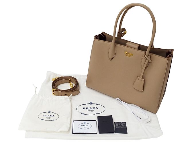 Tote Sac à épaule et cabas Prada en cuir rose beige - vue 7