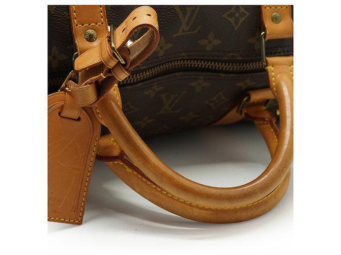 Louis Vuitton Monogram Keepall Bandouliere 60 Castaño - vista 10