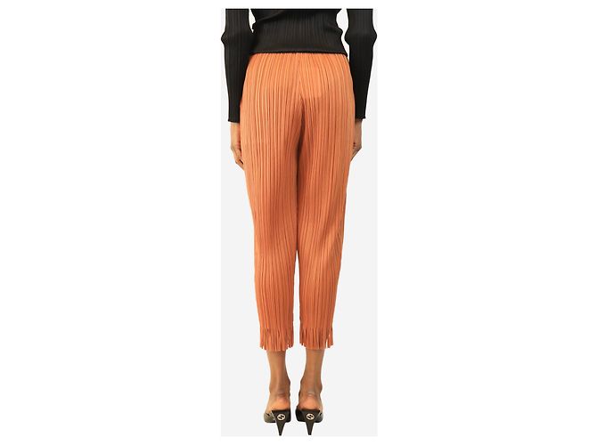 Pleats Please Pantalones plisados naranja tostado con dobladillo de flecos - size S - vista 3