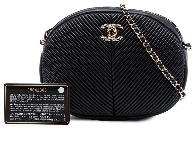 Bolso Camera Oval Plisado de Piel de Cordero Chevron Negro Chanel - vista 7