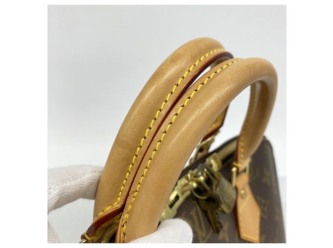 Louis Vuitton Alma Monogram Handtasche Braun - Ansicht 10