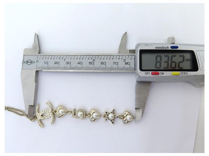 COLLANA CHANEL PENDENTE LOGO CC CUORE STELLA 2019 IN METALLO DORATO D'oro - vista 10