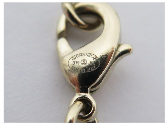 COLLANA CHANEL PENDENTE LOGO CC CUORE STELLA 2019 IN METALLO DORATO D'oro - vista 7