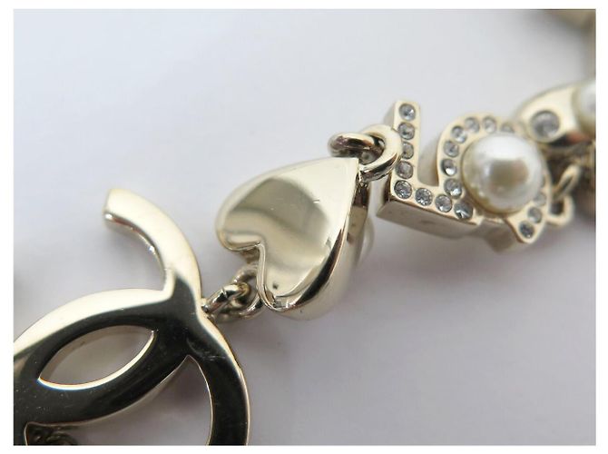 COLLANA CHANEL PENDENTE LOGO CC CUORE STELLA 2019 IN METALLO DORATO D'oro - vista 9
