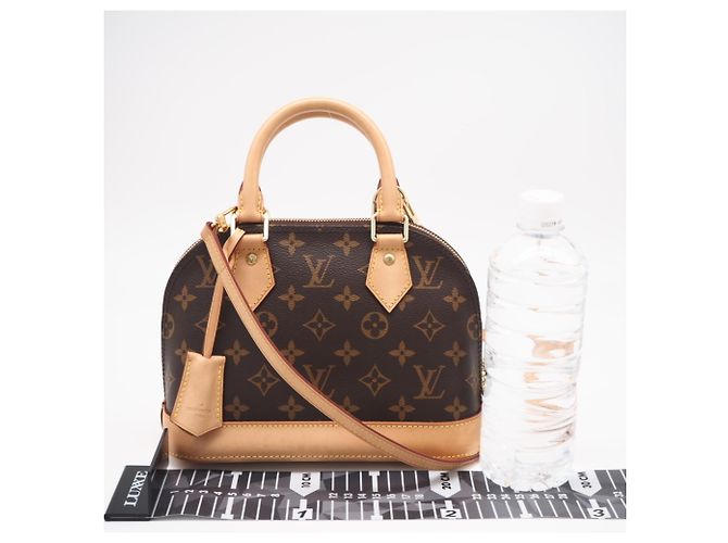 Bolsa Louis Vuitton Monogram Alma BB Marrom Bege - vista 3