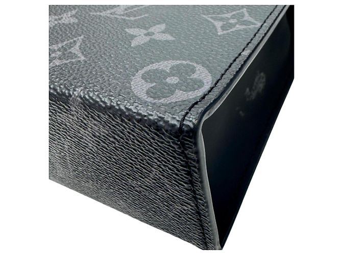 Louis Vuitton Pochette Voyage MM Clutch Bag Marrone Nero Monogramma - vista 9
