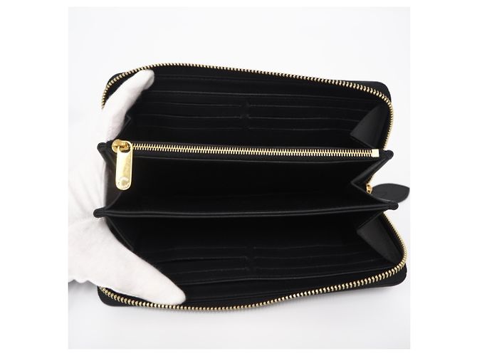Cartera Zippy Louis Vuitton Mahina en Noir Negro Dorado - vista 10