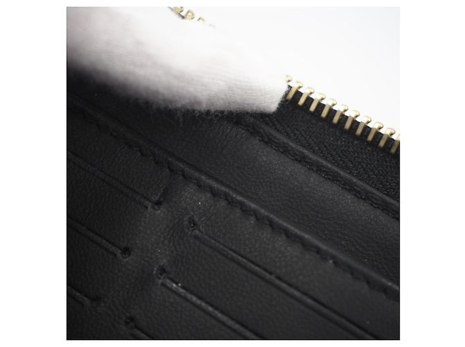 Cartera Zippy Louis Vuitton Mahina en Noir Negro Dorado - vista 13