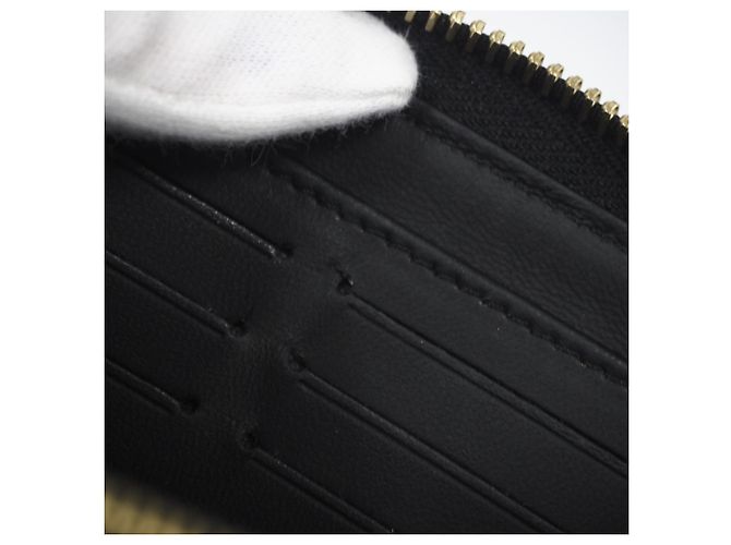 Cartera Zippy Louis Vuitton Mahina en Noir Negro Dorado - vista 14