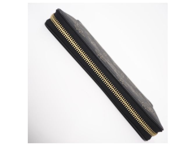 Cartera Zippy Louis Vuitton Mahina en Noir Negro Dorado - vista 5