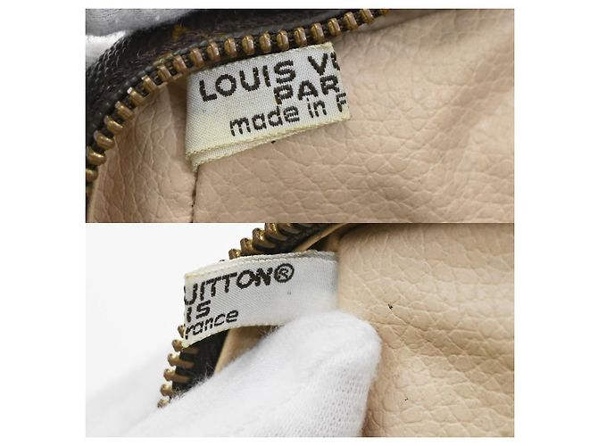Louis Vuitton Trousse Toiletry Monogram Canvas 23 Castaño - vista 6