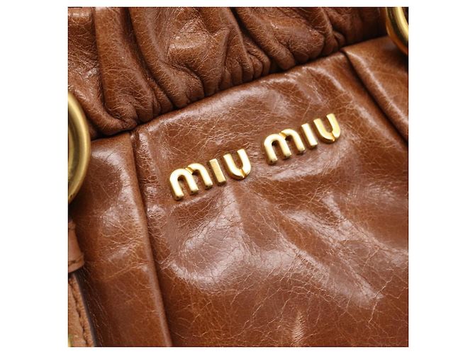 Borsa a mano Miu Miu con fiocco laterale in pelle 2way Brown Gold RT0383 Auth am12737M Marrone D'oro - vista 18
