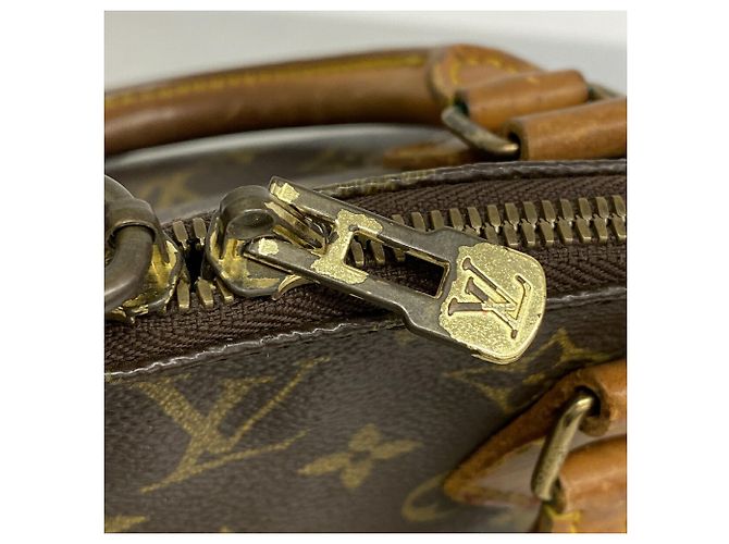 Bolso de mano Louis Vuitton Alma Monogram M51130 Castaño - vista 10