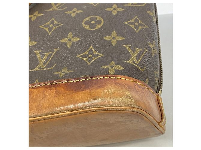 Bolso de mano Louis Vuitton Alma Monogram M51130 Castaño - vista 7