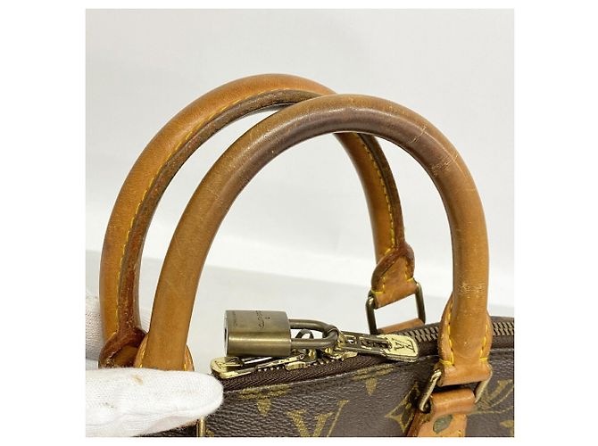 Bolso de mano Louis Vuitton Alma Monogram M51130 Castaño - vista 8