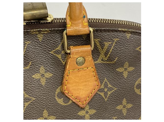 Bolso de mano Louis Vuitton Alma Monogram M51130 Castaño - vista 9