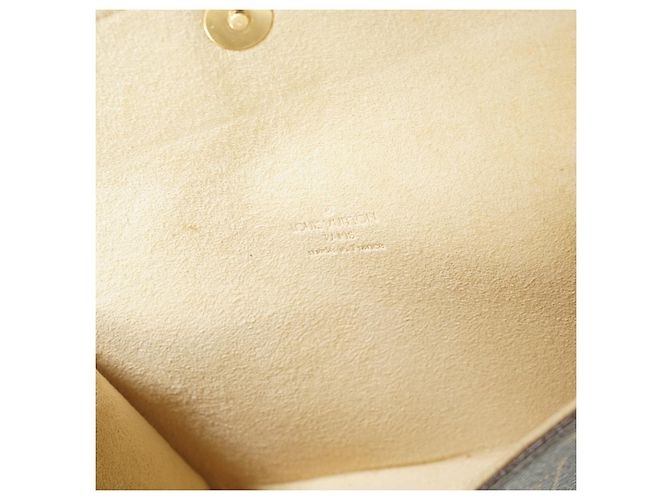 Louis Vuitton Monogram Pochette Florentine Castaño Beige - vista 10