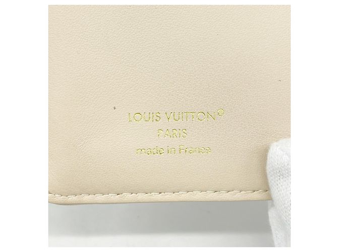 Cartera Louis Vuitton Monogram Embossed Beige - vista 4
