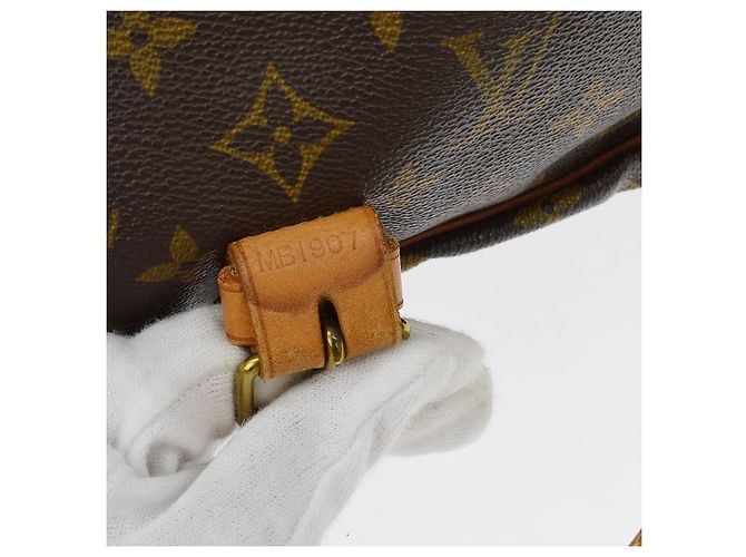 Louis Vuitton Saumur Monogram Canvas 35 Castaño - vista 5
