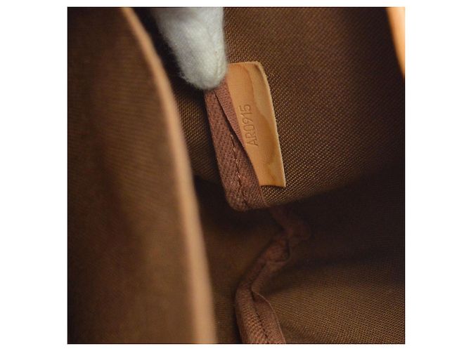 Louis Vuitton Saumur Monogram Canvas 35 Marrone - vista 5