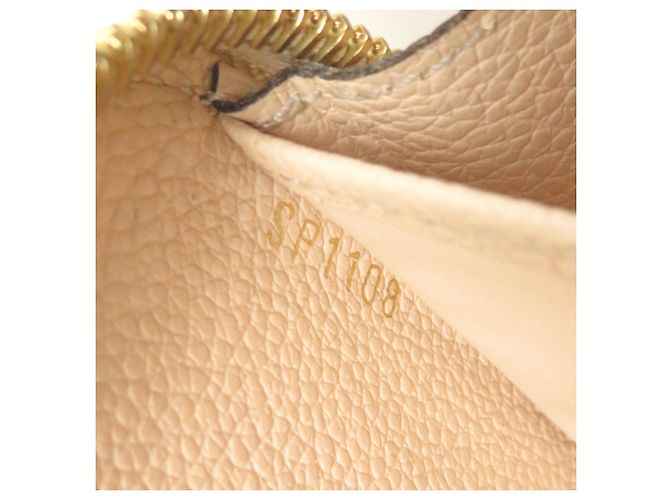 Portefeuille Zippy Louis Vuitton en Cream Écru - vue 8