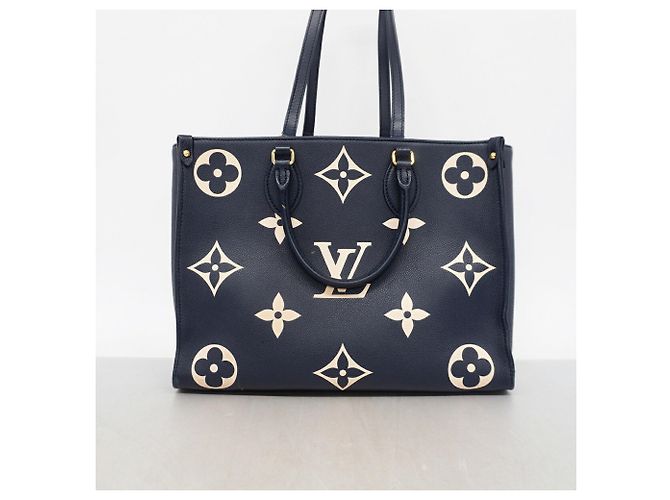 Borsa Tote Louis Vuitton Monogram Empreinte Bicolor OnTheGo MM Blu Crudo - vista 12