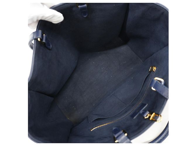 Borsa Tote Louis Vuitton Monogram Empreinte Bicolor OnTheGo MM Blu Crudo - vista 4