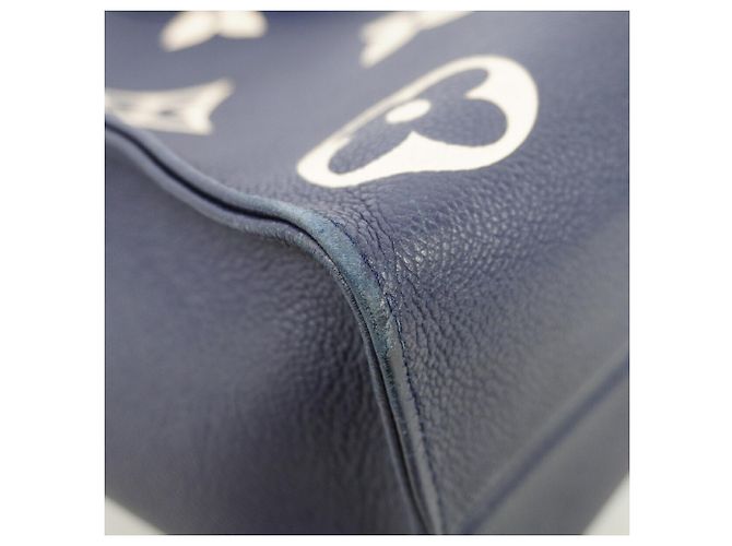 Borsa Tote Louis Vuitton Monogram Empreinte Bicolor OnTheGo MM Blu Crudo - vista 6