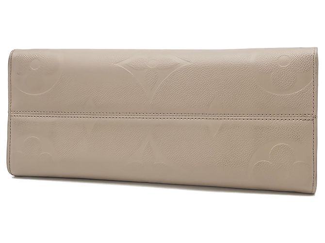 Louis Vuitton Beige Monogram Empreinte OnTheGo MM - vista 3